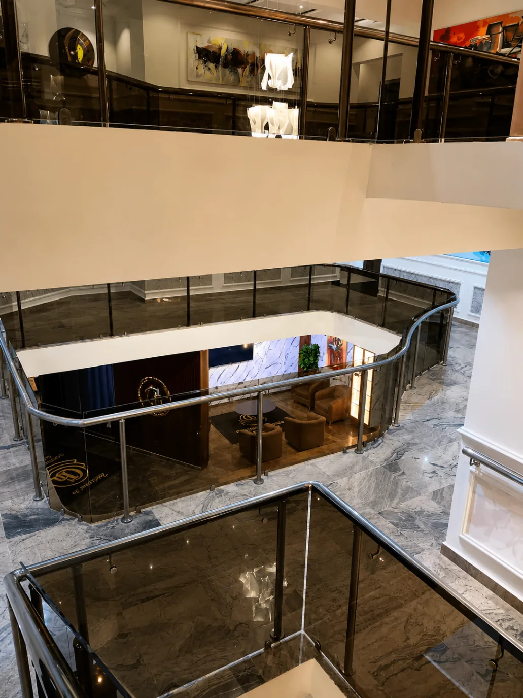 Stair landing view across the hotel's open central space